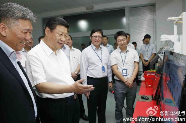 习近平视察东软集团 体验远程医疗系统